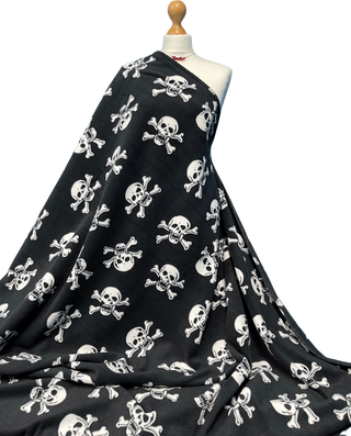 Buy white-skulls Printed Polar Fleece Fabric Skull Prints